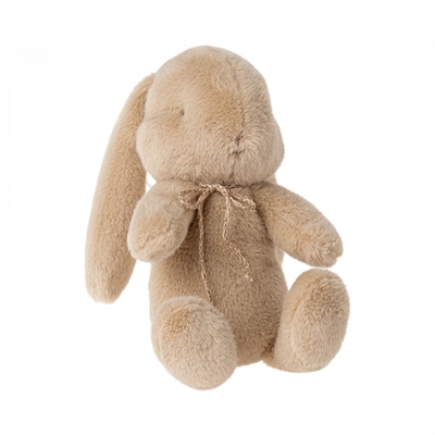 Cream peach farvede bamse kan sidde af sig selv